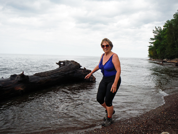 Karen Duquette walking in Lake Superior